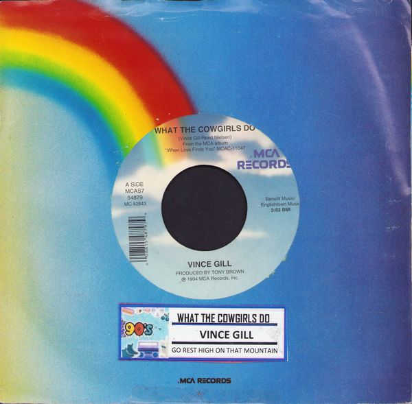 Gill, Vince - What The Cowgirls Do/Go Rest High On That Mountain (with jukebox label and company sleeve) - EX8/ - 45 rpm Records