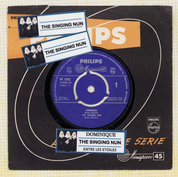 Singing Nun - Dominique/Entre Les Etoiles (British Pressing with removable spindle adapter, sung in French, with jukebox label and company sleeve) - EX8/ - 45 rpm Records